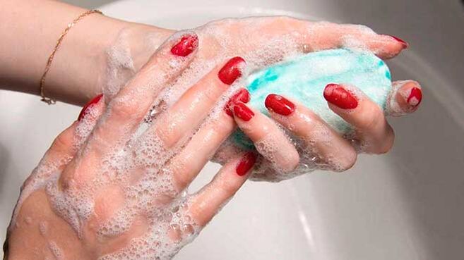 wash hands with soap to prevent infection with worms